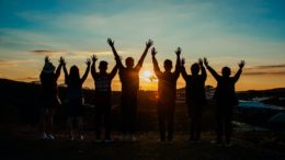 people silhouette during sunset